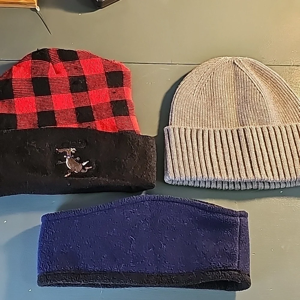 3 winter hats. Gray beanie, new. Red beanie used, ear muff reversible.